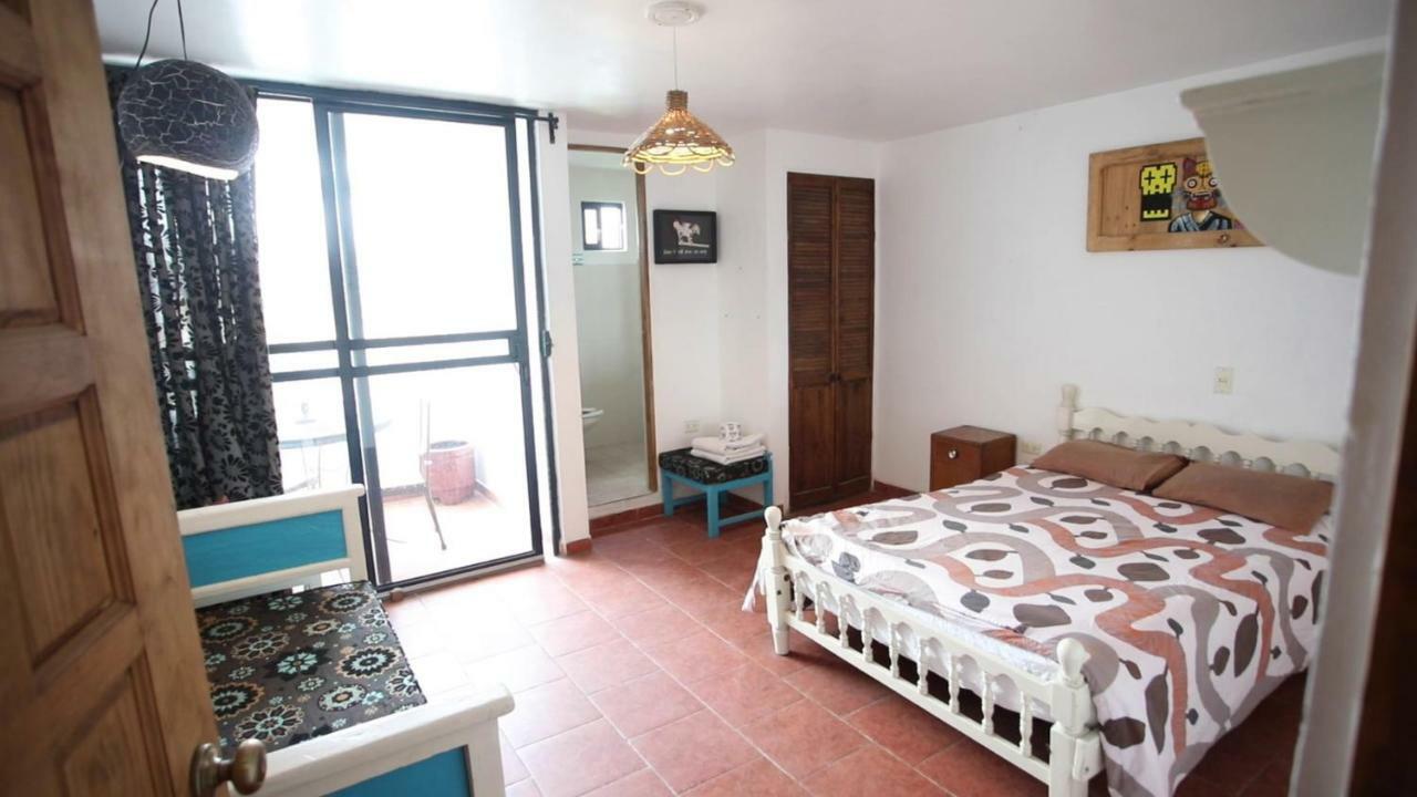 Hostal El Cascabel Чолула Экстерьер фото